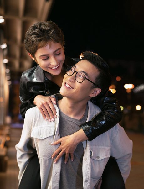 happy-woman-hugging-man-medium-shot